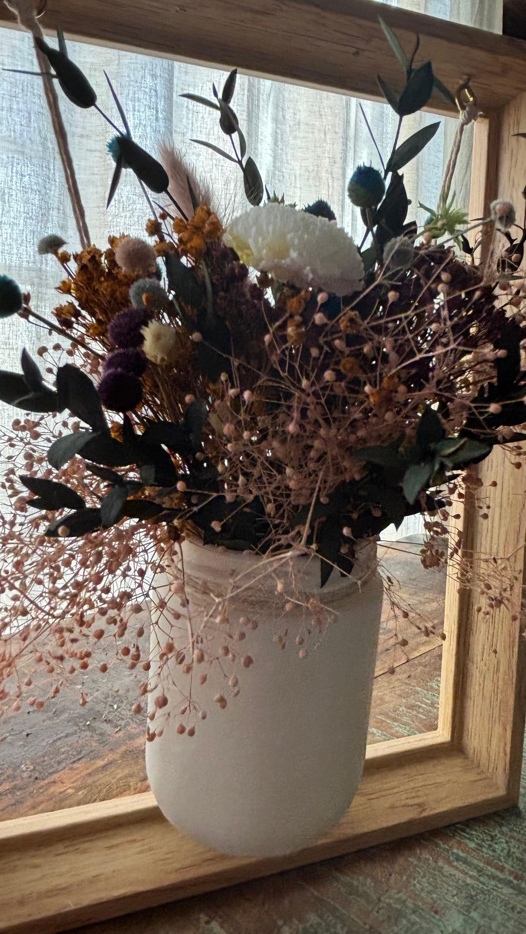 Centro colgante en marco de madera