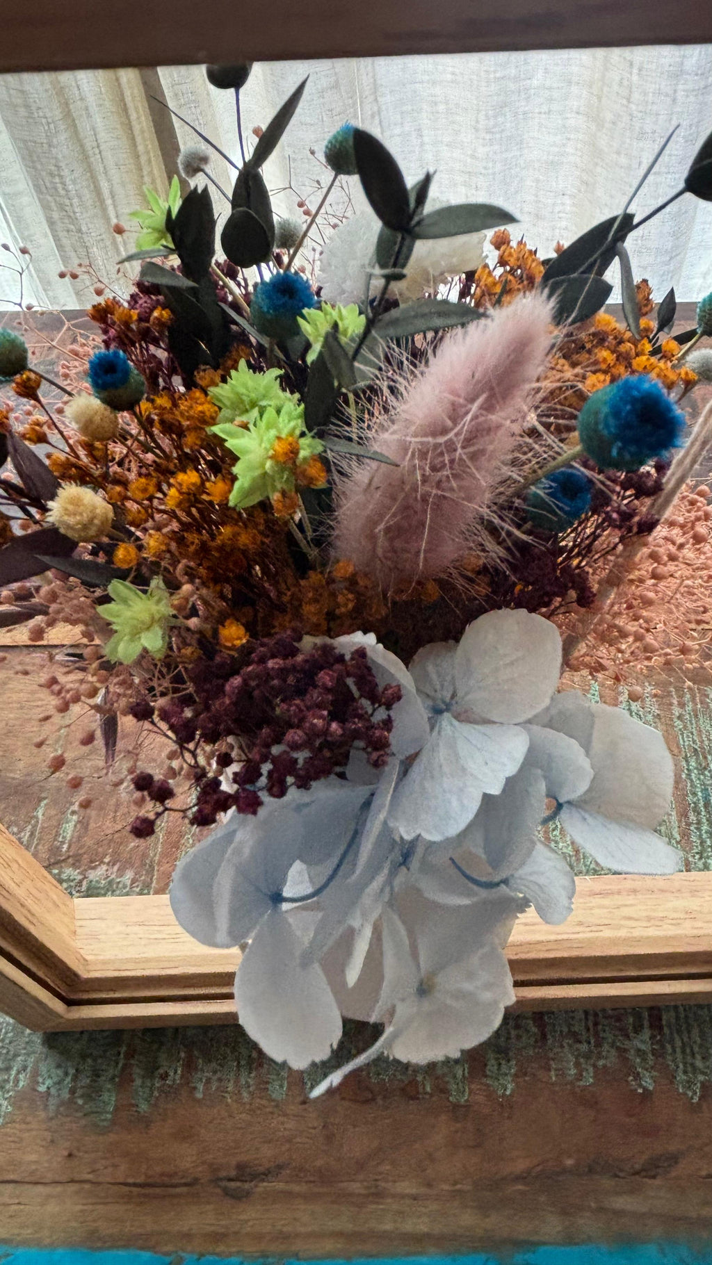 Centro colgante en marco de madera